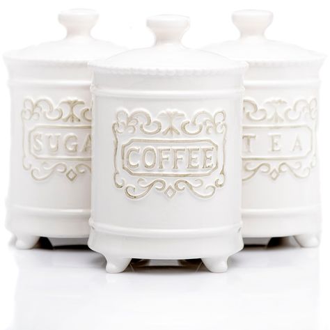 PRICES MAY VARY. Ceramic Canisters That Serve More Than One Purpose: These 4.5” farmhouse canisters for kitchen counter not only provide a place for you to neatly store three of the most common kitchen items, but they'll also bring a touch of class to your home Store Those Daily Brews and Sugar In Style: Included are three 25-ounce ceramic canisters with lids; These stylish white canisters stand out with their unique, eye-catching shape and beautiful engravings of the words Coffee, Tea, and Suga Farmhouse Canisters For Kitchen, Ceramic Kitchen Canister Sets, Farmhouse Canisters, Ceramic Kitchen Canisters, Ceramic Canister Set, White Canisters, Coffee Bar Station, Sugar Storage, Ceramic Canisters