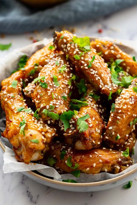 Honey Glazed Chicken Wings sprinkled with sesame seeds and fresh cilantro Honey Glazed Chicken Wings, Honey Wings Recipe, Honey Chicken Wings Recipe, Chinese Honey Chicken, Asian Chicken Wings, Honey Baked Chicken, Honey Chicken Wings, Glazed Chicken Wings, Braised Chicken Breast