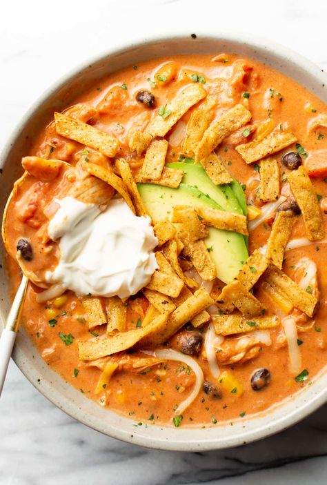 a bowl of creamy chicken tortilla soup with a spoon Creamy Chicken Tortilla Soup, Salt Lavender, Chicken Tortilla Soup Recipe, Chicken Tortilla Soup Easy, Mexican Soup Chicken, Chicken Tortillas Soups Recipe, Tortilla Soup Recipe, Simple Chicken, Savory Soups