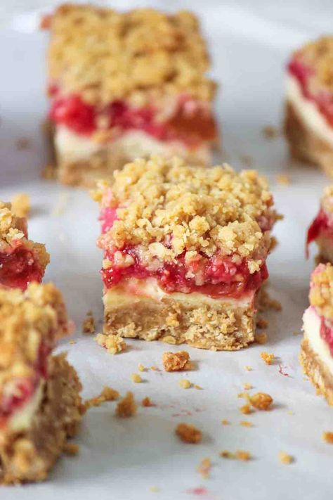 Strawberry Rhubarb Streusel Cheesecake Bars | And They Cooked Happily Ever After Rhubarb Filling, Strawberry Rhubarb Bars, Oatmeal Cookie Crust, Rhubarb Cheesecake, Rhubarb Desserts Recipes, Strawberry Cheesecakes, Rhubarb Bars, Mini Strawberry Cheesecake, Strawberry Cheesecake Recipe