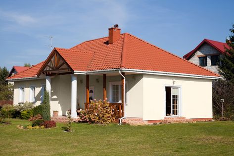 Houses with warm red roofs are popular for classic, rustic, farmhouse, country, Spanish, or modern aesthetics. But you're probably stumped on what col... | 10 Lily of the Valley Roof House Ideas, Red Roof House Colors, Shutter Paint Colors, Buying A New House, Red Roof House, Tan House, Green Shutters, Roof Paint, Roof House