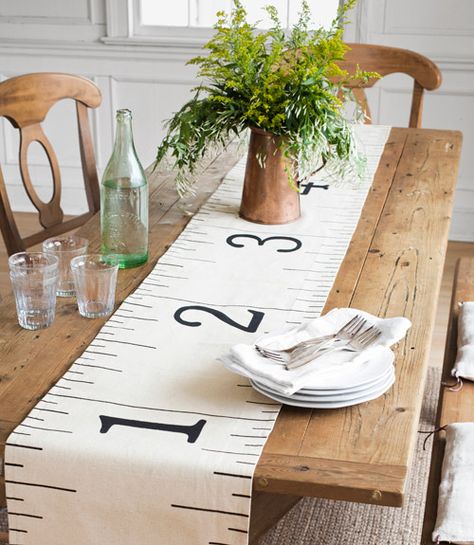 Oh my gosh! How cute would this be at a wedding!! "How to make a cute table runner out of a drab hardware-store dropcloth." http://countryliving.com/crafts/projects/hardware-decor-0211#slide-2 Ruler Table, Deco Champetre, Tafel Decor, Back To School Party, Quirky Decor, Pola Kristik, Decoration Originale, Drop Cloth, Cool Ideas