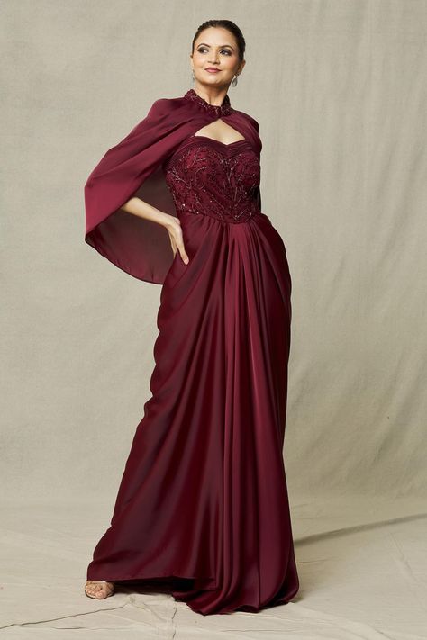 Maroon Bead Embroidered Sequin and Floral Embroidery Draped Gown With Cape Cape Gown Indian, Cocktail Dress Indian Wedding, Maroon Gowns, Maroon Gown, Western Gowns, Gown With Cape, Noodle Strap, Reception Gowns, Cape For Women