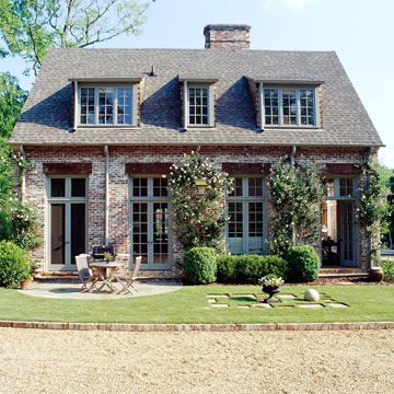 Create Patterns with Dormers  If lots of light is needed, triple shed dormers are a great solution. However, playing with widths and placing a skinny window between two wider windows adds a hint of the unexpected. Mixing sizes also prevents a crowded roofline. Home Designs Exterior, Shed Dormer, Lots Of Windows, Dormer Windows, Casas Coloniales, Hus Inspiration, Garden Cottage, Brick House, Cottage Homes