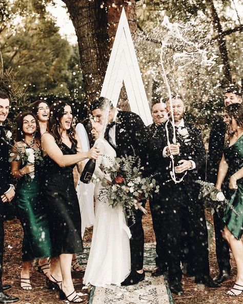 Celebrate “just married” with a champagne spray photo of the bride and groom, just like Alex and Dylan did with their wedding party at their January wedding in Orlando, Florida. #weddingday #weddingtips #weddingceremony #weddinginspo #justmarried Wedding Champagne Spray Photo, Champagne Wedding Photography, Champagne Spray Wedding Photo, Champagne Spray Photo, Champagne Spray, Bride And Groom Champagne, Forest Shoot, Casual Bride, January Wedding