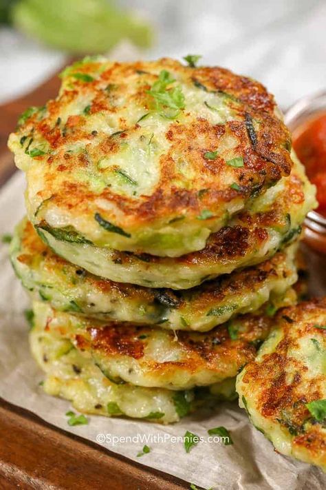 These zucchini panackes are one of my favorite snacks without all of the guilt! #spendwithpennies #zucchini #keto #snacks #zucchinipancakes #appetizer #easyappetizer #easyrecipe #easysnack Veggie Pancakes, Zucchini Fritters Recipe, Zucchini Pancakes, Fritters Recipe, Easy Zucchini, Zucchini Fritters, Bread Appetizers, Fritter Recipes, Zucchini Recipes