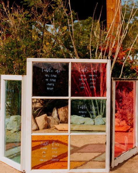 Turning repurposed, stained-glass windows into a seating chart is simple and yields gorgeous results. Wild Heart Events used only white marker to finish off this colorful iteration. Nontraditional Wedding Arch, Stained Glass Table Decor, Simple Seating Chart Wedding Ideas, Burnt Orange Wedding Ideas, Glass Seating Chart, Mosaic Wedding, Wedding Stationary Design, White Marker, Orange Theme