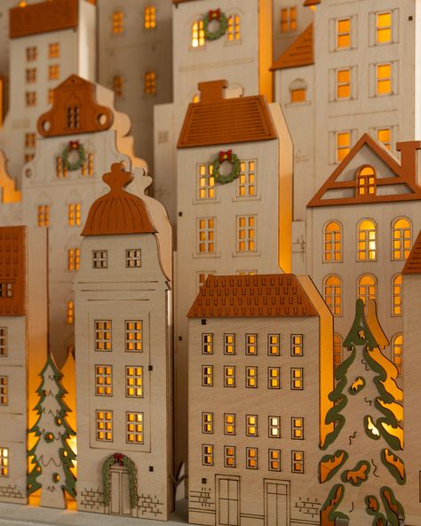 Bring the warmth of yesteryear into your home this Christmas season. Crafted from natural wood and lit from within, this miniature village awakens memories of a simpler time. | 23" Natural Lit Wooden Olde Town Cityscape, Width 13 in by Balsam Hill Advent Calendar House, Realistic Christmas Trees, Slim Tree, Christmas Village Houses, Christmas Mantel, Christmas Town, Light Crafts, Cozy Holiday, Christmas Mantels