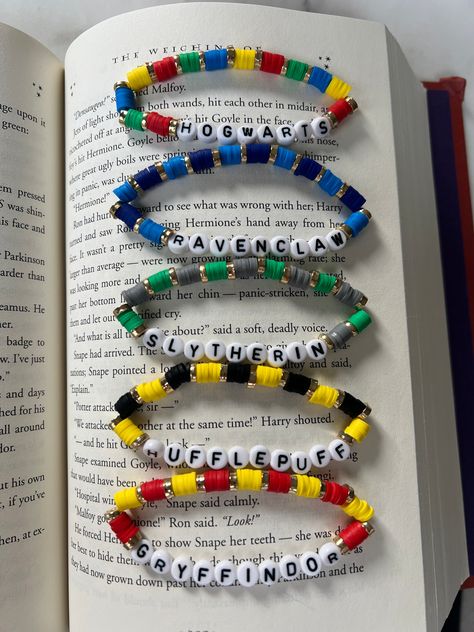 Show off your Harry Potter spirit with the set of all the Hogwarts Houses! The bracelets are 7 inches, 7.5 inches can be requested! Colors may vary slightly! I cannot change anything except the size! Prongs Harry Potter, Love Potion Bracelet, Harry Potter Clay Bead Bracelets, Harry Potter Kandi Bracelets, Harry Potter Inspired Bracelets, Harry Potter Themed Gifts Diy, Harry Potter Beaded Jewelry, Friendship Bracelets Harry Potter, Harry Potter Handmade Gifts