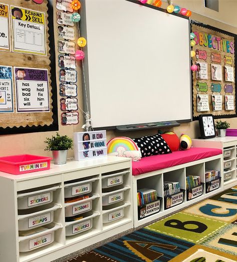 Bulletin Board In Classroom, Kindergarten Library Center Ideas, 1st Grade Hallway Displays, Preschool Computer Center, Carpet Squares For Classroom, Learning In Wonderland, Happy Hues Classroom Decor, Turn In Bins Classroom, Preprimary Classroom Decoration