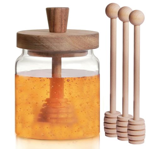 PRICES MAY VARY. High quality glass and wood: made of high quality transparent glass and 100% natural wood, non-toxic, tasteless, pollution-free and safe. Durable to last in your home for years! The perfect gift for any occasion: Looking for a thoughtful and elegant gift? Our Honey dispenser and spoon set is a memorable and heartfelt gift. It's ideal for a housewarming celebration, a thank-you gift, or just to show someone you care. Extra honey sticks: The Honey jar glass contains 3 honey dipper Syrup Container, Honey Dispenser, Honey Container, Honey Spoons, Honey Bottles, Honey Sticks, Honey Dipper, Bee Honey, Honey Jar