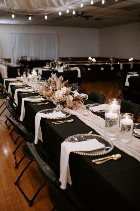 Black And Champagne Table Decor, Pampas Black Wedding, Black Tablecloth With Beige Runner, Gold And Black Wedding Theme Decor, Black White Pampas Wedding, Black Wedding Decorations Classy Wedding Table Decor, Champagne And Black Party Decor, Black Table Runners Wedding, Black Round Tablecloth Wedding