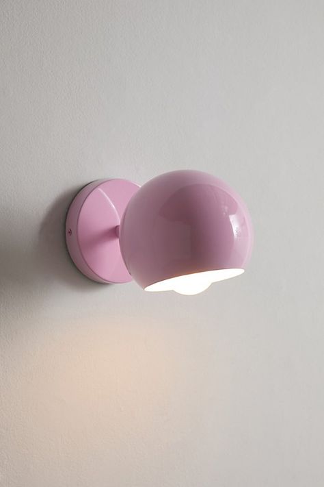 Add contemporary intrigue to your hallways, reading nooks and bedside with our Gumball Sconce. Features a globe-shaped shade sculpted from iron with vibrant finishes that lend a fun pop of color to your space. Available exclusively at Urban Outfitters. Features Gumball Sconce from UO Home Iron wall sconce fitted with a globe-shaped shade Perfect for illuminating hallways & bedrooms Hardwired Requires one E26 Type B 40W - not included UO exclusive Content + Care Hardwired; professional installati Bedroom Sconces Bedside, Cool Light Fixtures, Kids Bedroom Walls, Bedside Wall Lights, Iron Wall Sconces, Salon Suites, Uo Home, Future Apartment Decor, Wall Lights Bedroom