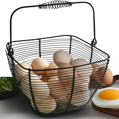 PRICES MAY VARY. Small wire egg basket for fresh eggs size is W7.3inches*H5.7inches(not include handle) ,egg gathering baskets for fresh eggs can hold 3 dozen eggs. Egg basket for fresh eggs is made of high quality coated wire. Egg gathering baskets for fresh eggs has good corrosion resistance and wear resistance, can ensure that the egg basket with handle will not rust, thus extending the service life of the wire egg baskets for fresh eggs. Wire chicken egg basket easier to clean, just by wipin Egg Collecting Basket, Chicken Basket, Farmhouse Baskets, Egg Baskets, Storing Eggs, Chicken Wire Basket, Wire Egg Basket, Farmhouse Basket, Collecting Eggs