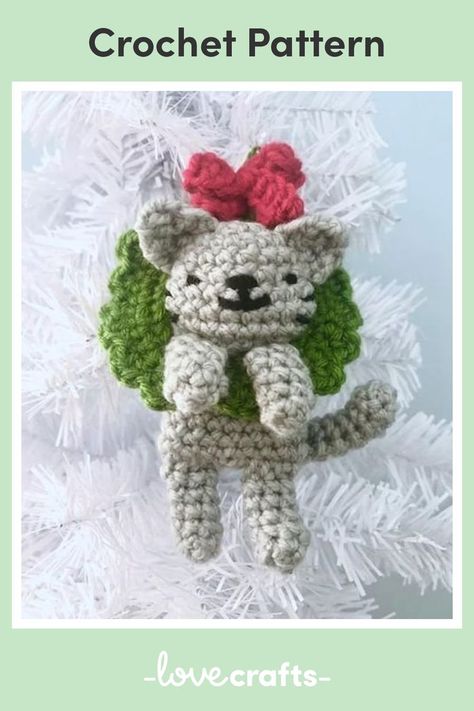 Looking for a unique and heartwarming addition to your Christmas tree? Check out this beginner-friendly crochet pattern by Amy Gaines for a charming cat in a wreath Christmas ornament! You'll fall in love with its simplicity and charm. Download the pattern and start stitching today! Chat Crochet, Cat Christmas Ornaments, Deer Pattern, Crochet Ornaments, Christmas Patterns, Ornament Pattern, Christmas Ornament Pattern, Crochet Christmas Ornaments, Cat Christmas