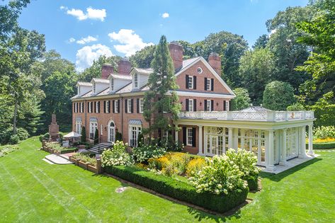 With grounds as majestic as the interiors, this beautiful Greenwich, Connecticut estate does not disappoint. Georgian Style Homes, Greenwich Connecticut, Lush Lawn, Red Brick House, Grand Foyer, Covered Pergola, Fountains Outdoor, Stunning Interiors, Country Estate