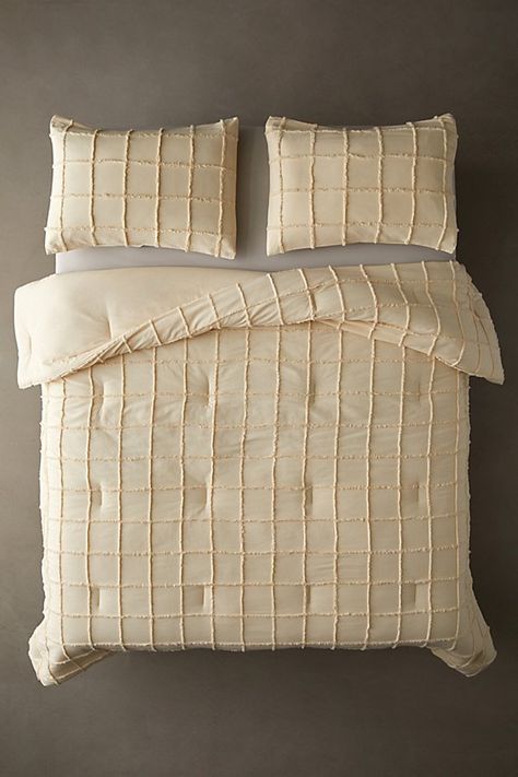 Infuse your sleep sanctuary with textural appeal with this medium-weight comforter in soft, gauzy cotton featuring a tufted grid allover the top panel. Finished with a solid cotton panel at the back for a cooling sensation. Pair it with our Tufted Grid Sham Set for a coordinating bedding look. Available exclusively at Urban Outfitters. Features Textural comforter from UO Home in crisp, gauzy cotton Finished with tufted geometric detailing allover the top An eco-friendly upgrade, this item is OEK Grid Comforter, Urban Outfitters Bedding, Pastel Danish, Duvet Covers Urban Outfitters, Dream Dorm Room, Weighted Comforter, Urban Outfitters Home, Dream Dorm, Pinterest Contest