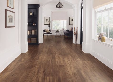 Design tip! Use deep, richly colored tones like the Character Walnut colorway from Karndean Designflooring to create a warm, welcoming mood in your home. Stop in and see us at Creative Carpet & Flooring to get a closer look at Character Walnut and a sample for your home. Dark Brown Vinyl Flooring, Dark Vinyl Flooring, Modern Linoleum Flooring, Brown Vinyl Flooring, Oak Floor Living Room, Classic Interior Design Living Room, Dark Living Room Ideas, Dark Flooring, Walnut Wood Floors