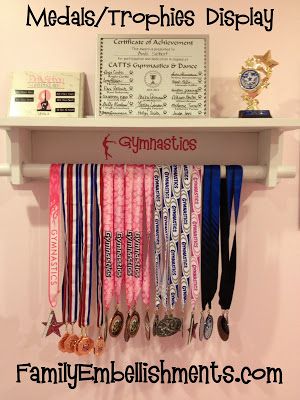 Medals/Trophies Display from FamilyEmbellishments.com Gymnastics Medal Display, Gymnastics Bedroom, Medal Displays, Gymnastics Room, Trophy Display, Ribbon Display, Award Display, Dance Rooms, Trophies And Medals