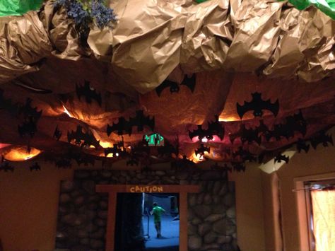 Cave Quest VBS. Nazarene Caverns. Bat cave Classroom Cave Ideas, Bat Cave Halloween Decorations, Bat Cave Transformation, Cave Classroom Decorations, Diy Bat Cave, Classroom Bat Cave, Cave Classroom Transformation, Bat Cave Room Transformation, Caveman Party Ideas