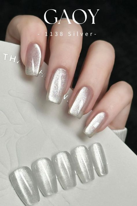 GAOY Silver Glitter Cat Eye Gel and Magnet Gel Manicure and Nail Art DIY at Home White Silver Cat Eye Nails, Silver Cateye Nailart, Silver Cateye Nail, Cat Eye Silver Nails, Milky White Cat Eye Nails, White Cateye Nail, Cat Eye White Nails, Silver Magnetic Nails, Cat Eye Nails White