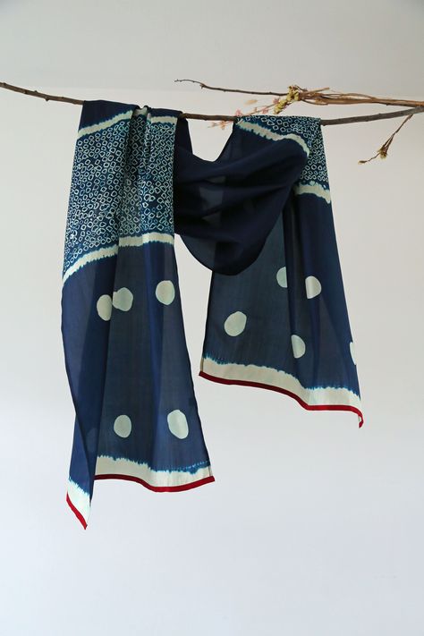 Intricately detailed from end to end, hand dyed in fine weave silk.~ PRODUCT SPEC: Bangalore silk scarf lovingly detailed and hand dyed by talented women artisans with many years of experience, in deep Indigo with intricate Bandhani and Itajime dye technique. The size is; 55 x 185 CM approx ~ THE STORY: Excited to reintroduce Namrata Shah. A multi talented creative as she’s gained a fruitful 5 years of first hand experience within the handloom industry after completing her education in Textile D Holiday Scarves, Indigo Textiles, Shibori Techniques, Dye Techniques, Tie Dye Crafts, Suit Ideas, Handloom Fabric, Deep Indigo, Textile Pattern Design