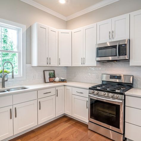 White shaker kitchen will provide a clean, bright look and light feel to any home. ⠀ ✨Put blinds, draperies, or window film to shadow your cabinets from direct sunlight. ✨When you start cooking, turn on the ventilation.⠀ ✨Don’t use scouring pads or abrasive cleansers.⠀ ✨Once a week, wipe your shaker cabinets with warm water and dampened soft cotton cloth. Add mild dishwashing liquid to the water if needed.⠀ ⠀ Do you have any helpful tricks to share?⠀ #whitecabinets #whitekitchen #kitchendesign Wooden Kitchen Cabinets, White Shaker Kitchen, Space Beautiful, Kabinet Dapur, Shaker Kitchen Cabinets, White Shaker Cabinets, Refinishing Cabinets, Stainless Steel Cabinets, Shaker Cabinets