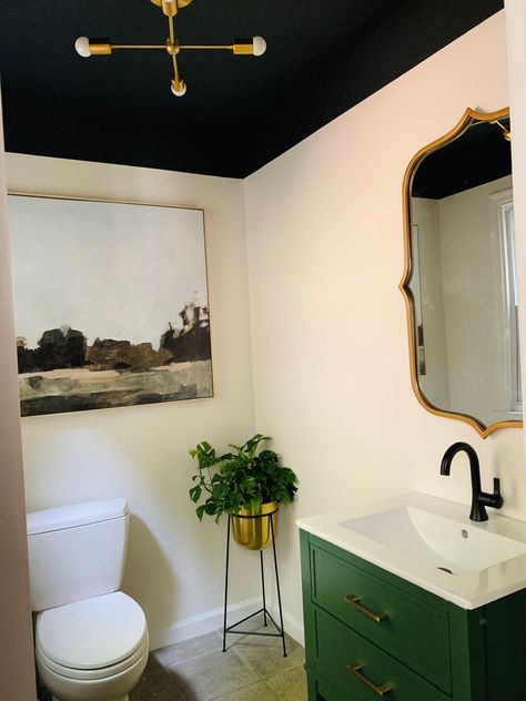 Black ceiling, mid mod vibes, green vanity Powder Room With Dark Ceiling, Dark Painted Ceilings Bathroom, Green Room Black Ceiling, Dark Ceiling Bathroom Ideas, Dark Blue Ceiling Bathroom, Bathroom Green Ceiling, Black Ceiling Powder Room, Dark Bathroom Ceiling Ideas, Dark Green Bathroom Ceiling