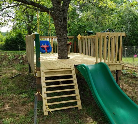 Outside Tree Decor, Small Diy Playground, Backyard Tree Decorating Ideas, Platform Play Area, Fort Around Tree, Tree Fort Around Tree, Play Yard Toddler Bed, Kids Outdoor Play Area Ideas Playground Design, Backyard Playground Ideas Diy