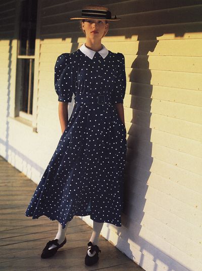 A-line forties style navy dress with white polka dots from Laura Ashley’s spring collection, 1986. Trend Alert- More dots for this spring, 2010! (Photo- Kim Knott) Related Nibs posts- Swimmin… Laura Ashley Dress 1980s, Laura Ashley 1980s, Laura Ashley Clothing, Laura Ashley 80s, Laura Ashley Patterns, Laura Ashley Vintage Dress, Laura Ashley Fashion, 90s Fashion For Women, The 80s Fashion