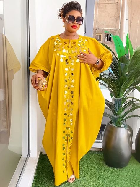 This beautiful plus-size African Ankara Dashiki dress is the perfect blend of tradition and luxury, making it an ideal choice for weddings, parties, proms, or other formal events. Featuring vibrant Ankara prints, this gown embraces African culture while offering a modern and flattering design. The luxurious fabric and flowing silhouette ensure comfort and elegance, while the tailored fit accentuates your figure. Whether you're attending a wedding, evening gala, or special celebration, this dress will make a statement and help you stand out with confidence.Crafted from high-quality materials, this dress is designed to provide both style and durability, ensuring that you can enjoy it for many special occasions. The rich colors and intricate Dashiki details highlight the beauty of African fas