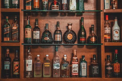 Photo by Adam Jaime on Unsplash   It's not always easy to be interested in the things you drink. Sometimes you just have a drink because you're thirsty and you're not that interested in what it tastes like. Other times, you can get bored of drinking the same things again and again. Perhaps you've had enough of soda or you're fed up with orange juice or coffee. But when you're not sure what the alternatives are, you can struggle to feel inspired to make a change.   If you want your drinks to be m Scottish Cottage, Absolut Citron, Whisky Collection, Gluten Free Alcohol, Whiskey Room, Diy Water Fountain, Best Alcohol, Bar Shelf, Rustic Bar