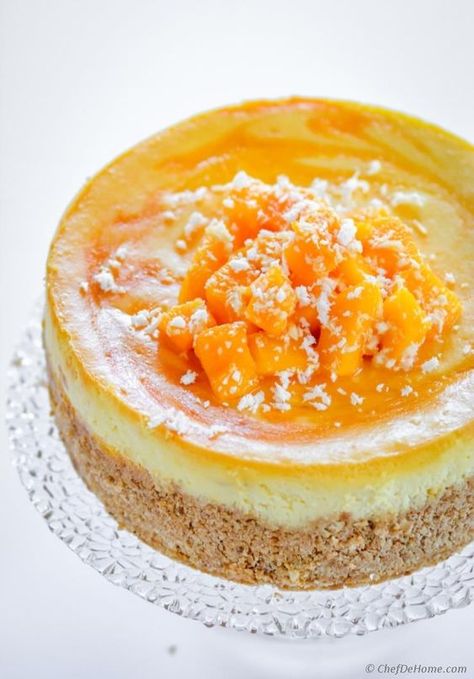 Mango Cheesecake Recipe | ChefDeHome.com Mango Cheesecake Recipe, Carrot Cake Cheesecake Recipe, Yummy Cheesecake, Carrot Cake Cheesecake, Mango Cheesecake, Mango Dessert, Gateaux Cake, Mango Recipes, Cheesecake Desserts