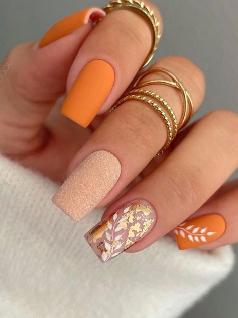 burnt orange acrylic nails with glitter and fall leaves Nail Ideas 2022, Orange Nail Ideas, Orange Nail Designs, Orange Nail, Nail Art For Beginners, Trendy Nail Art Designs, Sweater Nails, Simple Nail Art Designs, Thanksgiving Nails