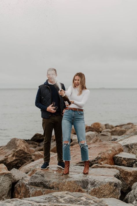 Rainy Beach Engagement Photos, Beach Winter Engagement Photos, Winter Beach Engagement Photos Outfits, Engagement Photos Beach Winter, Rainy Beach Photoshoot, Winter Beach Engagement Photos, Coastal Engagement Photos, Engagement Champagne, Rock Photoshoot