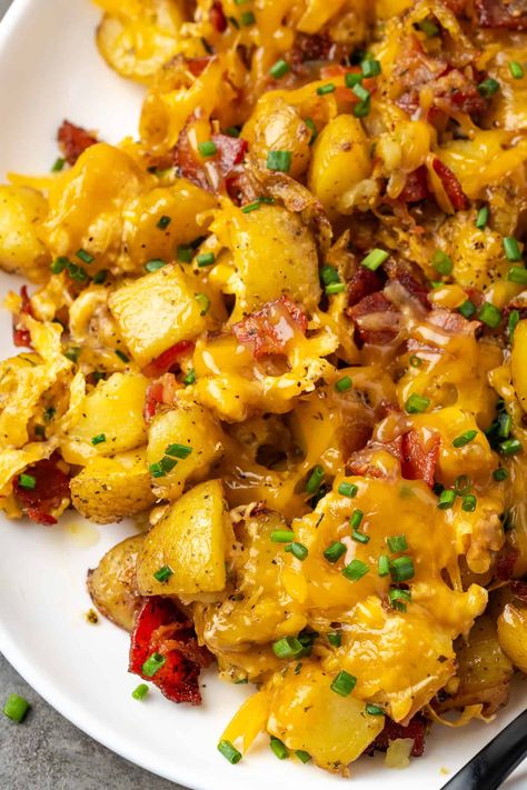 Cheesy ranch potatoes are the BEST roasted potatoes! They're tossed with zesty ranch seasoning and smoky bacon, smothered in melty cheddar. #cheesy #bacon #ranchpotatoes Best Roasted Potatoes, Roasted Ranch Potatoes, Cheesy Ranch Potatoes, Potato Cookies, Zesty Ranch, Bacon Ranch Potatoes, Cheesy Ranch, Ranch Potatoes, Cheesy Mashed Potatoes