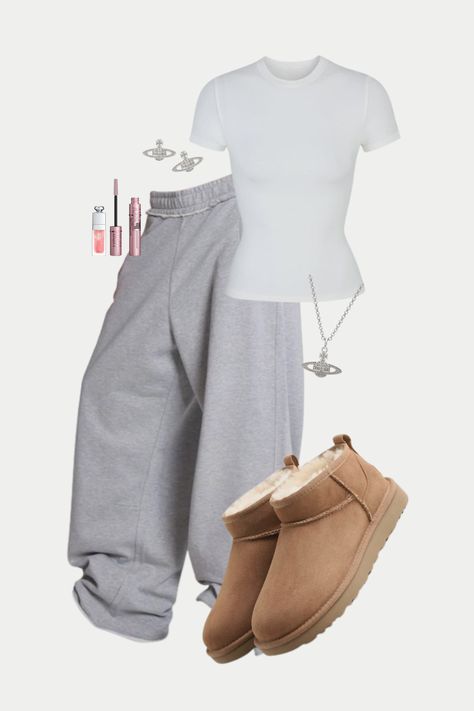 baggy oversized light gray grey sweatpants joggers, ultra mini brown uggs, white skims t-shirt, silver jewellery, vivienne westwood necklace, vivienne westwood earrings, maybelline skyhigh mascara, dior lip oil Baggy Gray Sweatpants Outfit, How To Style Light Grey Sweatpants, Gray Jogger Outfits Women, Outfit Ideas Grey Sweatpants, Baggy Grey Sweatpants Outfits, Outfits With Gray Sweatpants, Gray Sweats Outfit, Gray Joggers Outfit, Skyhigh Mascara