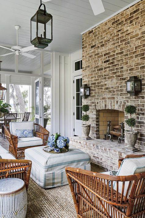 enclosed porch with brick fireplace and lantern lighting Ruang Tamu Outdoor, Southern Living Idea House, Southern Living Magazine, Porch Fireplace, Southern Living Homes, Southern Homes, Outdoor Living Room, Amelia Island, Porch Design