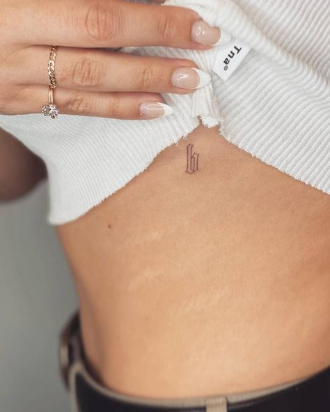 B Letter Tattoo, B Initial Tattoo, Letter B Tattoo Ideas, B Tattoos, Letter B Tattoo, Rib Tattoo Ideas, Pelvic Tattoos, Tattoos On Side Ribs, Shape Tattoo