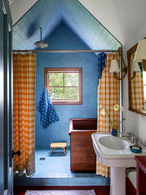 More of a Chromatic Getaway on the Massachusetts Coast | Architectural Digest Yellow Shower Curtains, French Dining Chairs, Attic Bathroom, Custom Sectional, Blue Tiles, Fabric Shower Curtains, Blue Walls, Architectural Digest, House Inspo