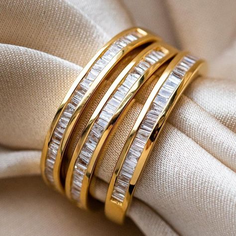 The Gold Baguette Eternity Diamond Band from Carrie Elizabeth is the ultimate stacking band! An absolute stunner that does not stop sparkling. The row of channel set baguette cut diamonds are meant to resemble an endless row of mirrors. Natural baguette cut diamonds .19 cts 14k gold vermeil plated Sterling silver base Dainty Gold Band, Fairytale Ring, Eternity Diamond Band, Elizabeth Jewelry, Local Eclectic, Baguette Ring, Baguette Cut Diamond, Vermeil Jewelry, Eternity Band Diamond