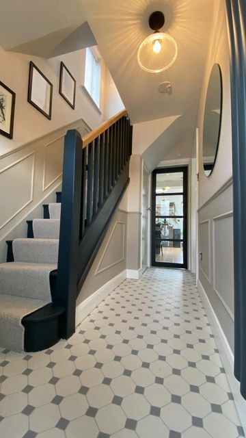 Patterned Tile Hallway, Terrace House Staircase, Make Hallway Look Wider, Hallway Half Panelling, Black Stairs Hallway, Natural Hallway Ideas, Carpet Hallway Ideas, Hallway With Panelling, Mirror At Top Of Stairs