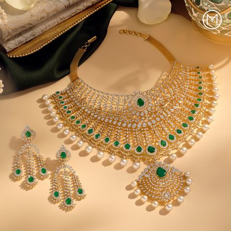 When skilled craftsmanship and glamour meet, what is conceived is jewellery that masterfully combines diamonds and coloured stones. Dazzle with brilliance as you grace yourself with this captivating piece. #BridesOfIndia #MalabarGoldAndDiamonds #ShowTheWay #IndianBrides #BridalJewellery #DiamondJewellery #Diamond Indian Diamond Jewellery Set, Necklaces Photography Ideas, Maharaja Jewellery, Jewel Video, Malabar Jewellery, Indian Diamond Jewellery, Creative Shoot, Beautiful Jewelry Diamonds, Photographing Jewelry