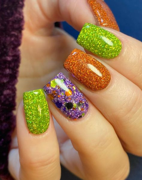 Halloween Chunky Glitter Nails, Purple And Green Nails Short, Halloween Nails Purple Green Orange, Halloween Nails Green Purple Orange Black, Kids Halloween Nail Ideas, Multi Color Halloween Nails, Halloween Skittle Nails, Purple Green Orange Nails, Purple Black Orange Nails