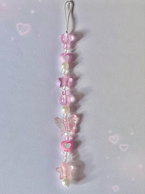 pink single phone charm! Pink Phone Keychain, How To Make Cute Phone Charms, Pink Bead Keychain, Phone Charm Designs, Pink Beaded Keychain, Cute Phone Charms Diy, Bracelet For Phone, Pink Phone Charm Aesthetic, Cute Pink Keychain