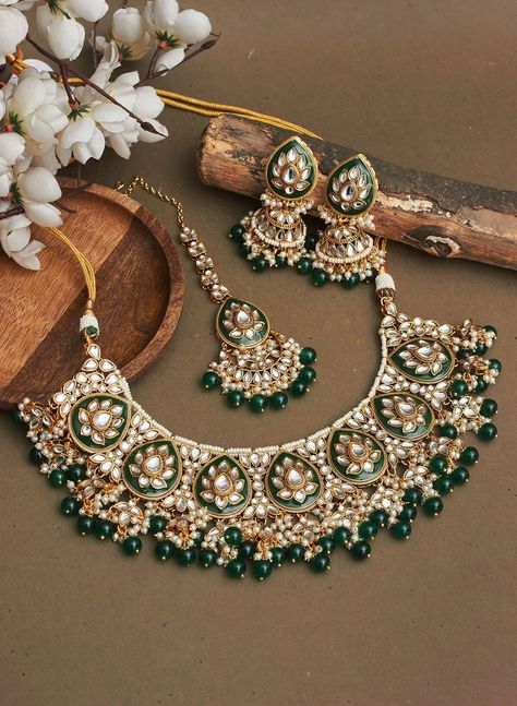 Adorn yourself with exquisite Bridal Kundan Jewellery in stunning shades of green and off white pearls. This Wedding jewellery, inspired by Indian and Pakistani traditions, features intricate designs including Jhumka earrings, Maangtika (forehead ornament), and Punjabi-inspired elements.  With vibrant ivory accents and green Meenakari work, this jewellery set is the perfect complement to your Indian wedding ensemble, radiating timeless beauty and capturing the essence of cultural heritage. Item includes: Necklace, earrings and maangtika Ready to be shipped with love from New Delhi, India  Please leave your phone number in notes or message when placing order for this item. Green Ivory Wedding, Green Jewellery Set, Bridal Kundan Jewellery, Wedding Jewellery Indian, Punjabi Jewellery, India Necklace, Wedding Planner Checklist, Kundan Jewellery Bridal, Green Themed Wedding