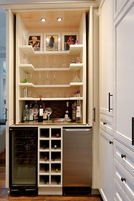 Move over butler...this is a bartenders pantry ;) Now this is what they need to start making instead of those silly office areas in kitchens. It's the same amount of space. hmm? maybe an area in our big room could use this! Small Wet Bar, Bar Nook, Wine Closet, Home Bar Cabinet, Closet Bar, Balcony Design Ideas, Home Coffee Stations, Indoor Bar, Built In Bar