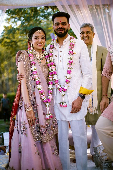 A Gorgeous Summer Lockdown Wedding With Soothing Pastel Decor And Couple Outfits Poo Malai For Wedding, Var Mala Indian Weddings, Rose Garland Wedding Indian, Flower Mala For Wedding, Rose Garlands Wedding Indian Flower, Garlands Wedding Indian Flower, Var Mala, Garland Wedding Indian, Jaimala Designs