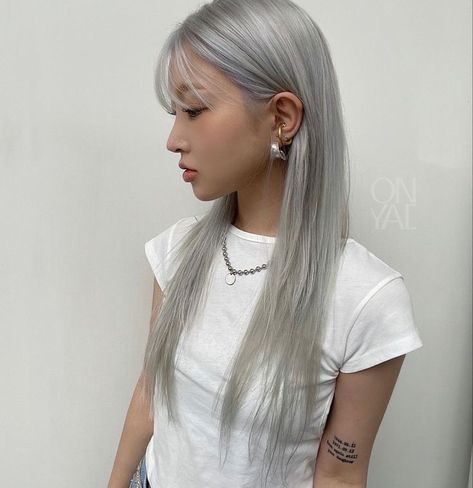 Silver Hair Tanned Skin, Platinum Blonde Hair Asian Tan, Silver Hair With Curtain Bangs, Asian With Silver Hair, Platinum Asian Hair, Silver Hair Tan Skin, Silver Hair On Tan Skin, Icy Blonde Hair Asian, Silver Asian Hair