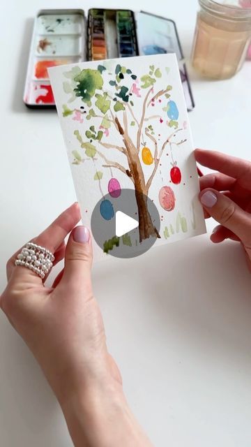 Anna Koliadych on Instagram: "A very cute idea for an Easter card with #watercolor-  how to paint a tree with colorful Easter eggs 🥰🪺🐣🎨 #watercolortutorial #watercolorvideo #craft #diy #easterdecor #eastereggs" Q Tip Art, Paint A Tree, Idea For Easter, Watercolor Video, Egg Painting, Coloring Easter Eggs, Easter Colors, Easter Card, Watercolour Tutorials